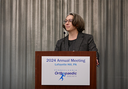 Dr. Kathryne Stabile at a podium